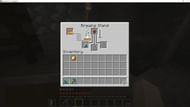 Crafting a potion of fire resistance (Image via Minecraft)